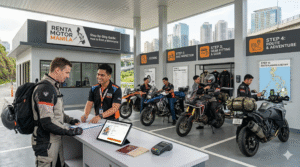A professional Renta Motor Manila rental station in Metro Manila showing a customer at the counter and staff preparing adventure motorcycles for a step-by-step rental process.